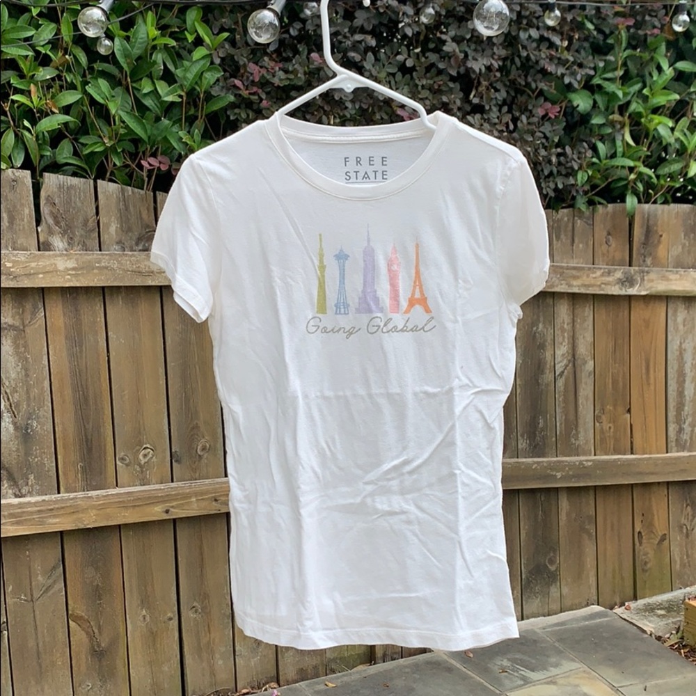 A white with colercul accents t-shirt